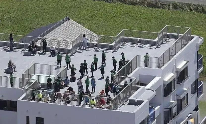 Tsunami Hits Japan, People Flee to Rooftops — God Bless Japan