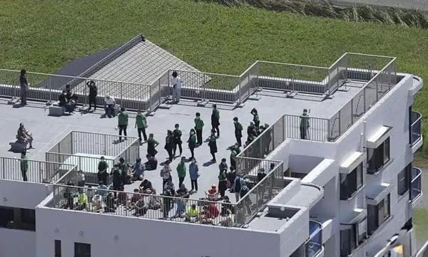 Tsunami Hits Japan, People Flee to Rooftops — God Bless Japan