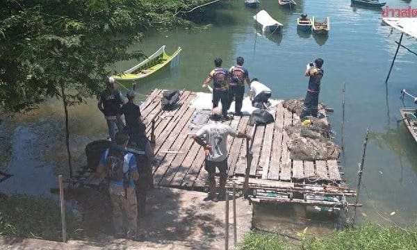 Unidentified Woman Found Chained to Concrete Dumbbells in Thailand, Dead Two Days